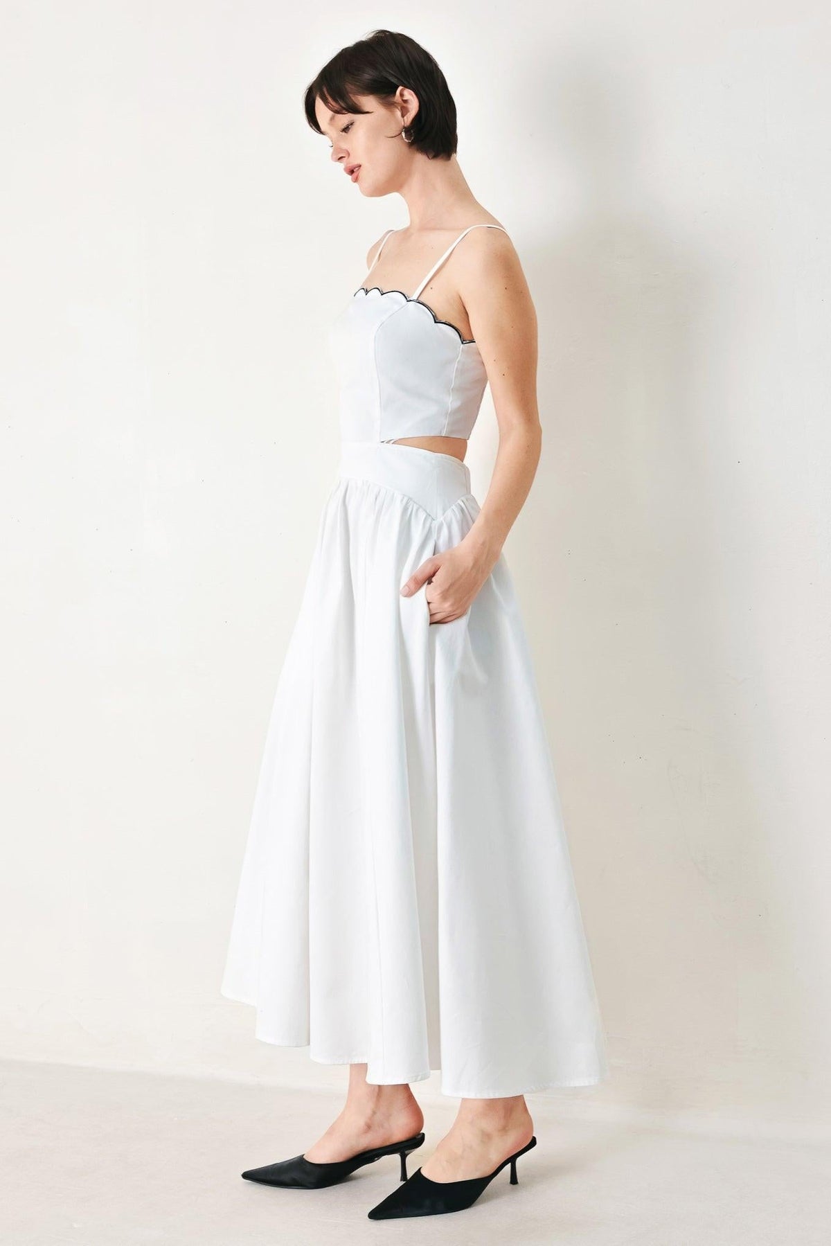 Flying Tomato Pure Elegance woven midi dress in white navy with a flowing, sleeveless design and intricate woven details.