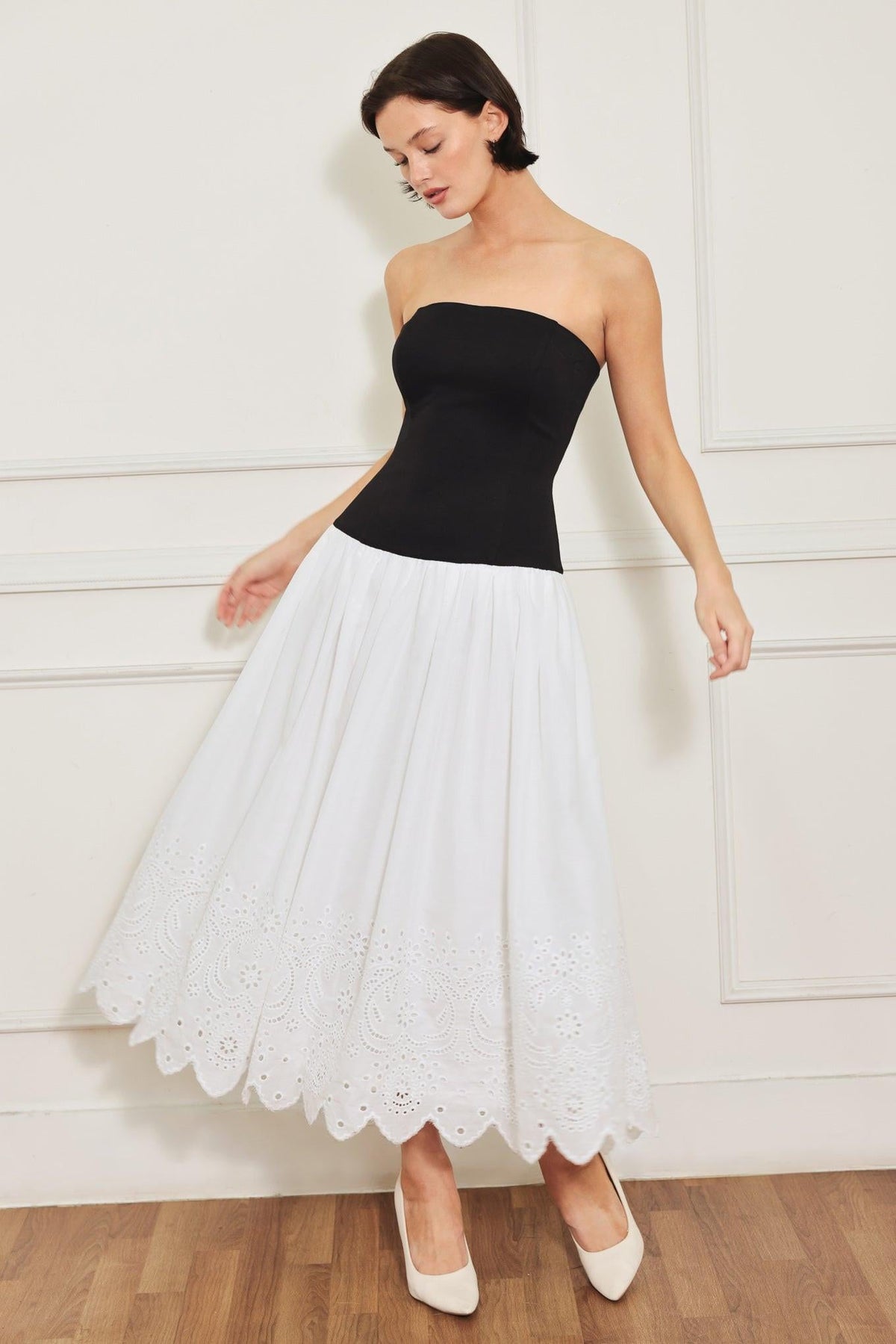White and black knit woven midi dress from Flying Tomato's Soft Spoken Beauty collection, featuring a stylish, comfortable design.