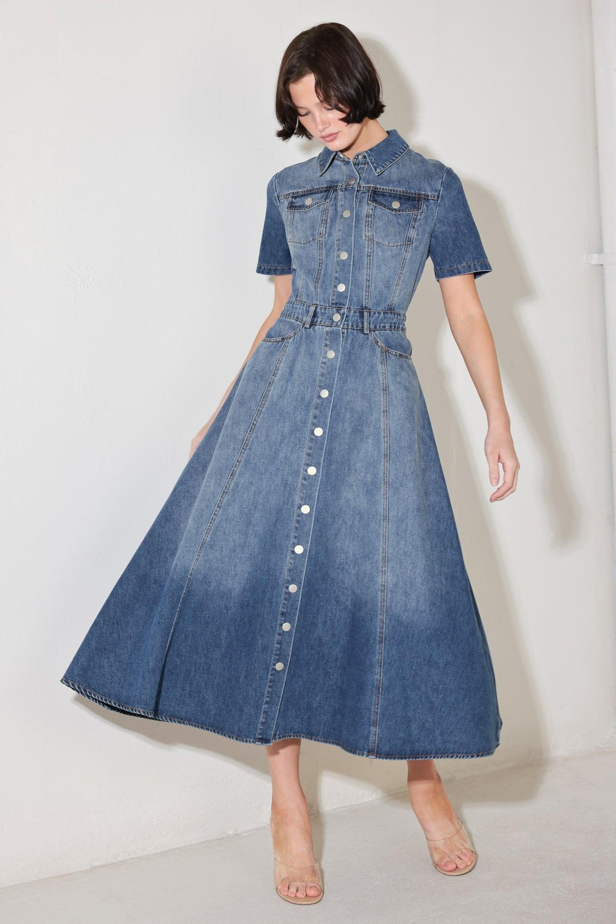 Flying Tomato Bluebird Promenade denim midi dress featuring a fitted waist and classic denim fabric, perfect for casual wear.