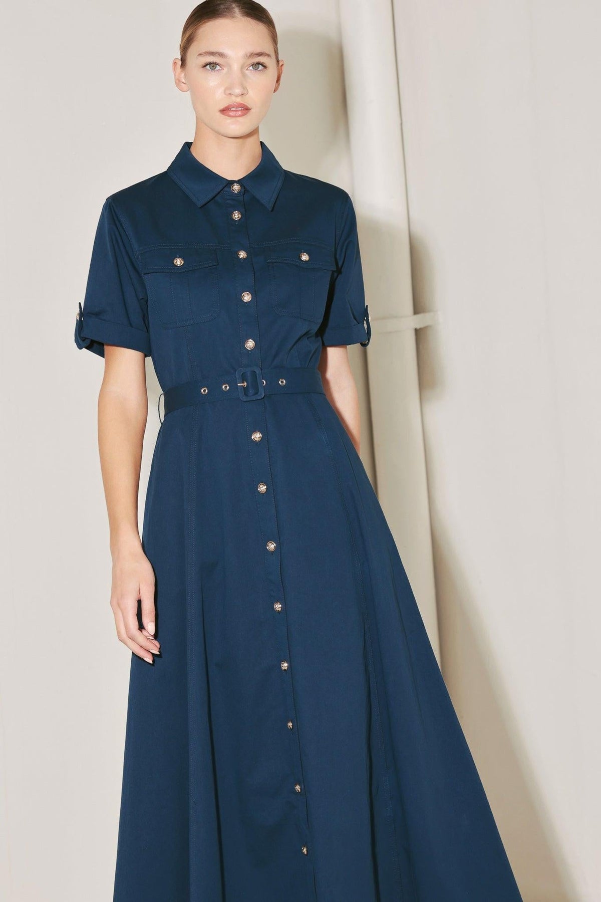 Navy woven midi dress by Flying Tomato featuring a classic authority style, sleeveless design, and a fitted waist.