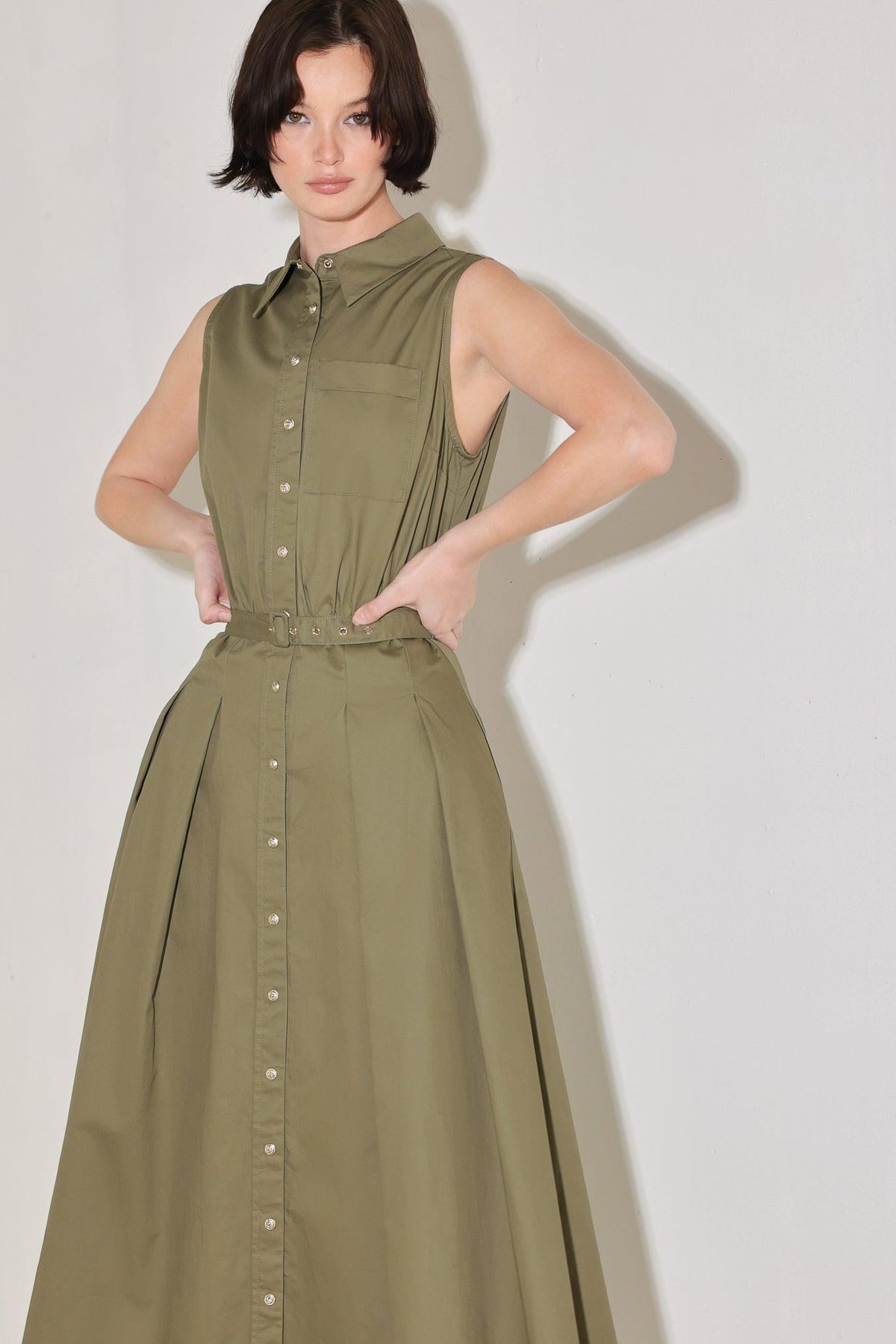 Flying Tomato Simply Unstoppable woven midi dress in olive green, featuring a flowy silhouette and sleeveless design.