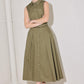 Flying Tomato olive green woven midi dress with a flowing, sleeveless design and subtle pattern, perfect for casual or semi-formal wear.