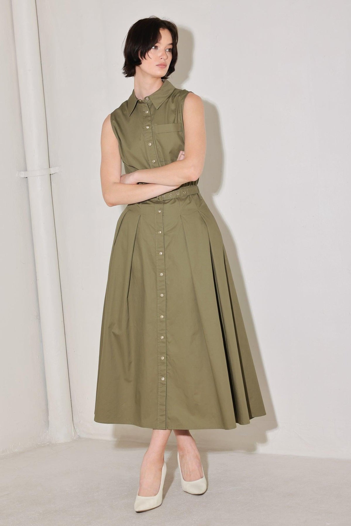 Flying Tomato olive green woven midi dress with a flowing, sleeveless design and subtle pattern, perfect for casual or semi-formal wear.