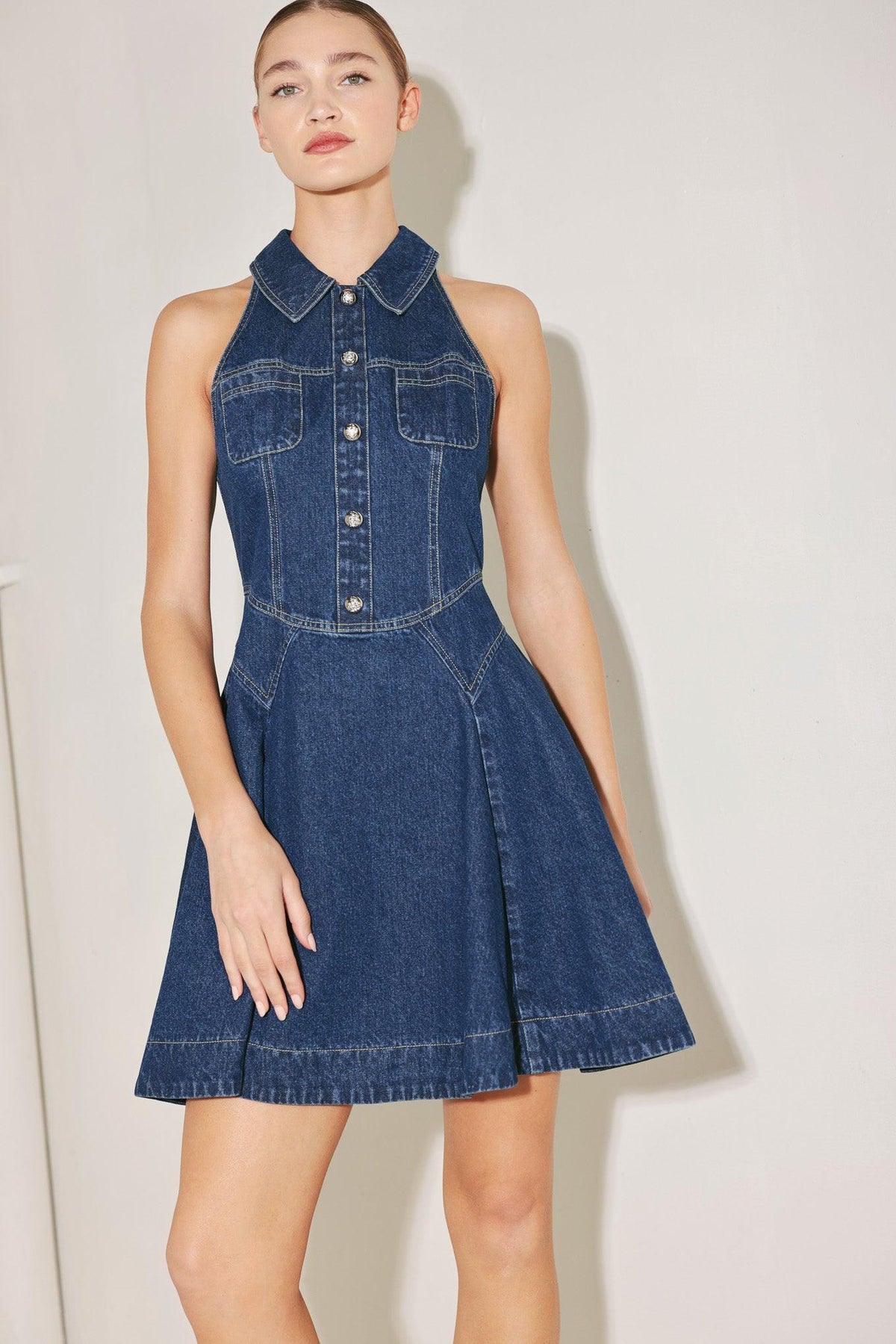Flying Tomato Cool Girl Comeback denim mini dress, indigo denim with short sleeves and fitted silhouette, front button closure.
