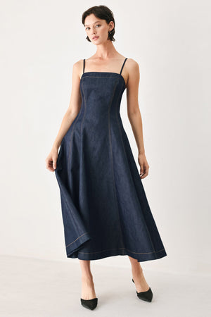Flying Tomato Coastal Denim Woven Midi Dress in dark denim, featuring a sleeveless design and a flowy, midi length silhouette.