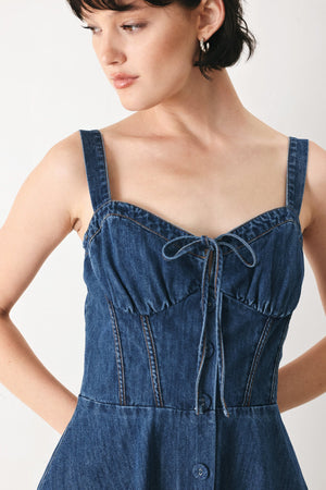 Blue Crush Denim Midi Dress by Flying Tomato, medium indigo color, sleeveless design with a fitted bodice and flowing skirt.