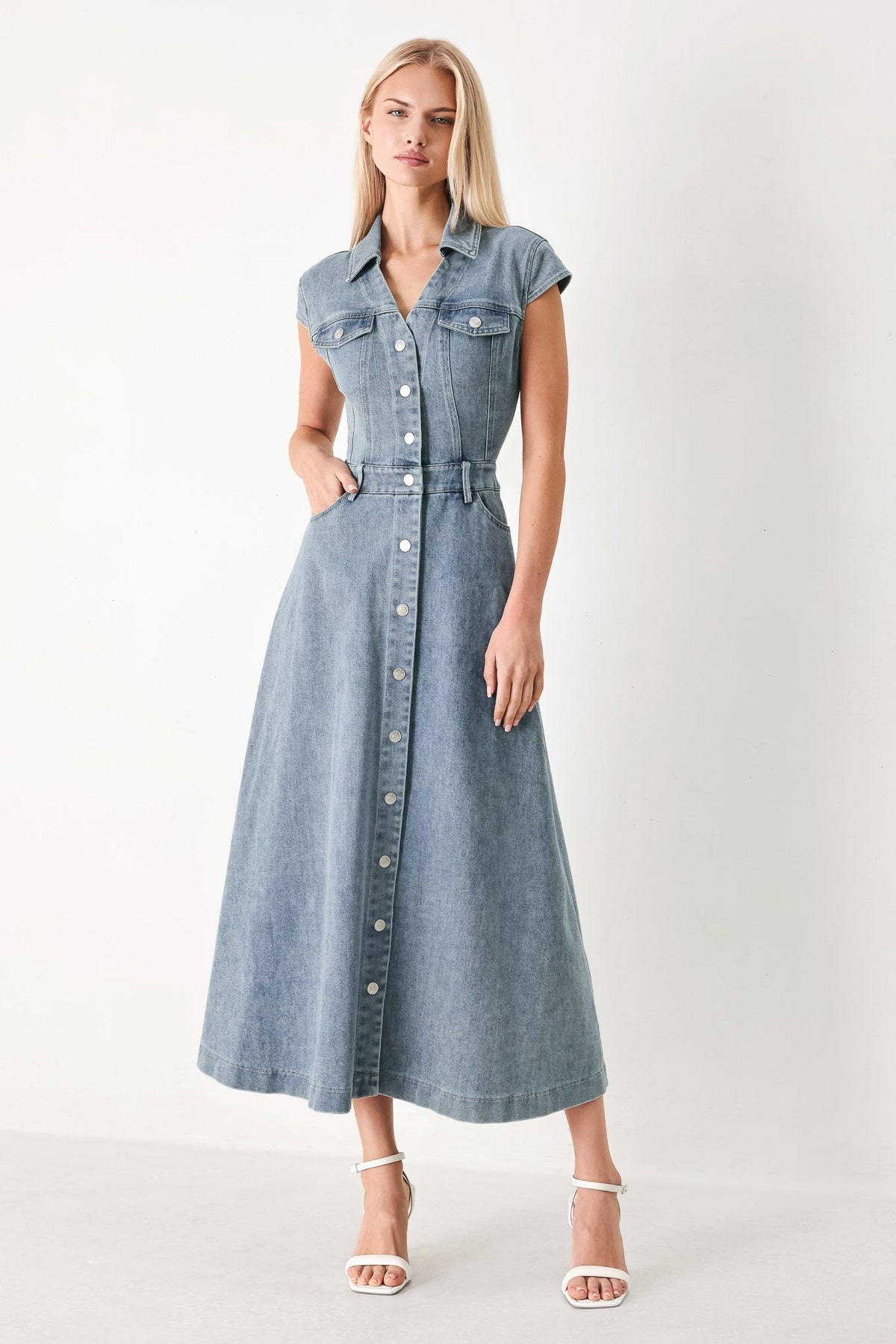 Light denim Classic Flow Denim Midi Dress by Flying Tomato, showcasing a relaxed fit with a round neckline and midi length.