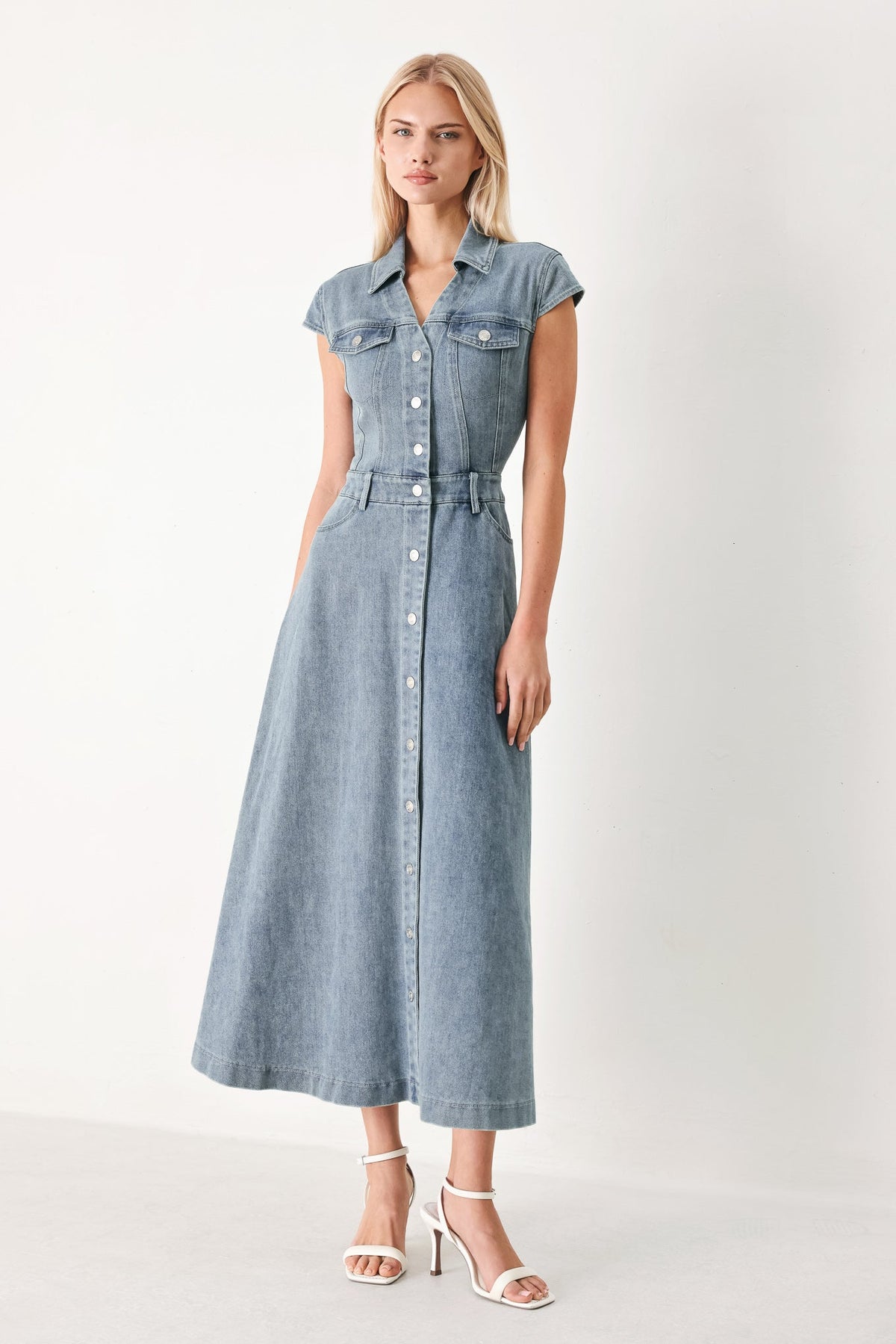 Light denim Flying Tomato Classic Flow Denim Midi Dress shown on a hanger with a relaxed fit and button-front design.