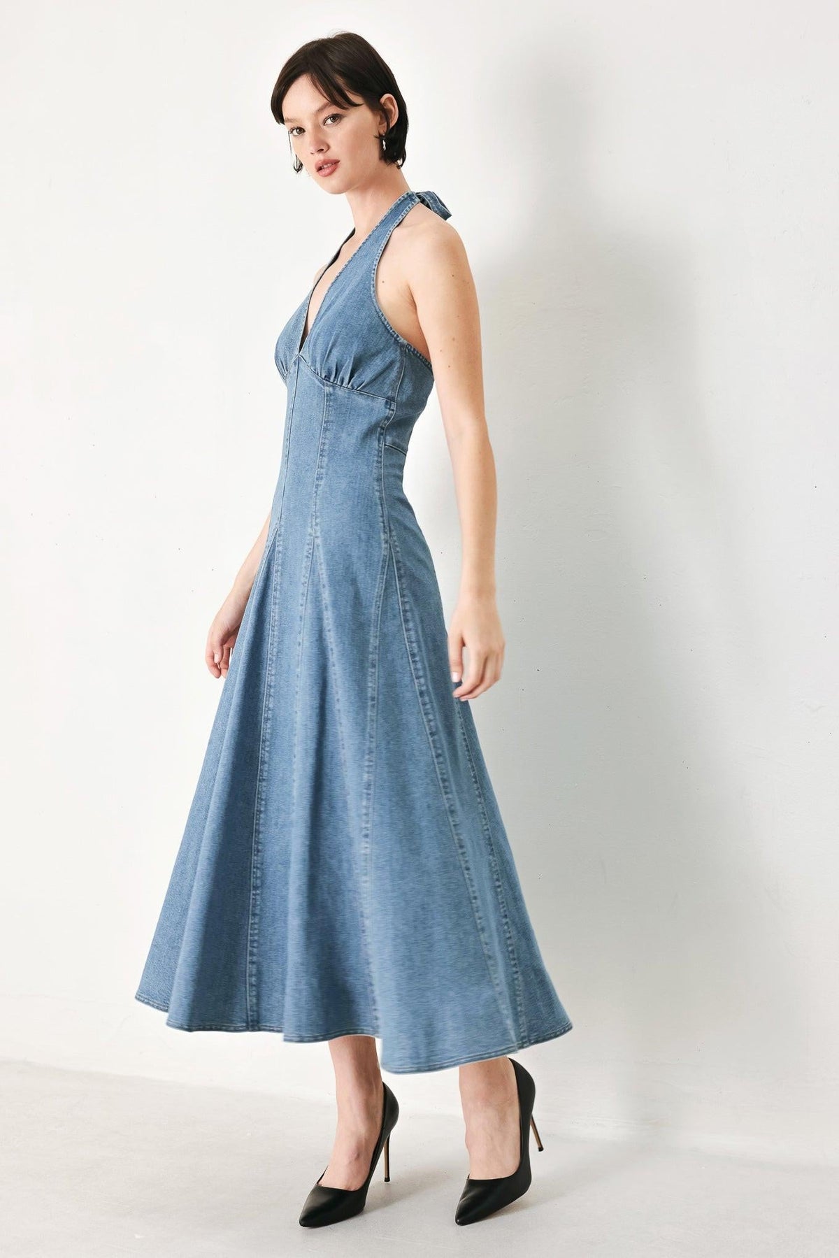 Flying Tomato blue blossom denim midi dress with a fitted waist and A-line skirt, shown on a model.