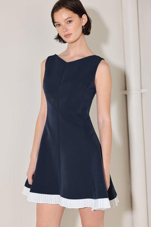 Flying Tomato Sweet Escape woven mini dress in navy and white with a relaxed fit and short sleeves, displayed on a hanger.