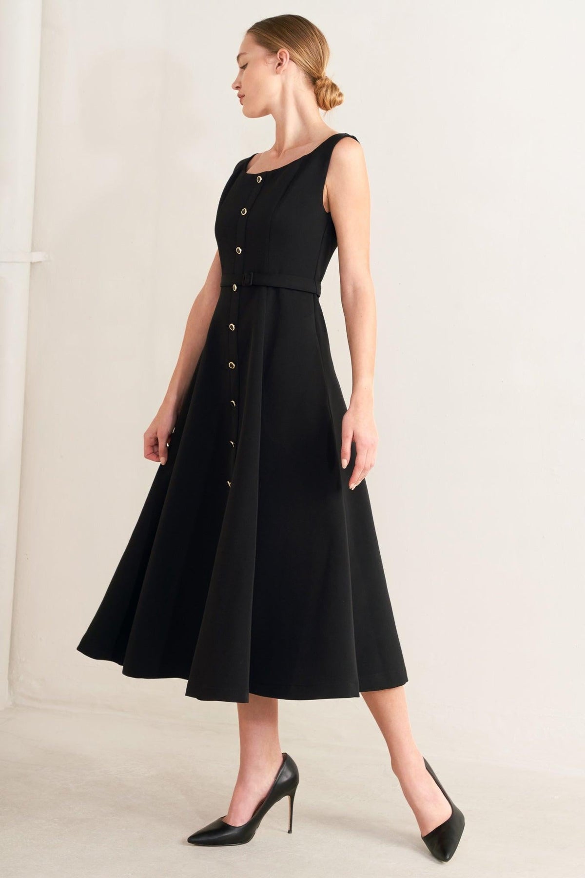 Black Paris After Dark woven midi dress by Flying Tomato, featuring a stylish, flowy fabric and elegant design.