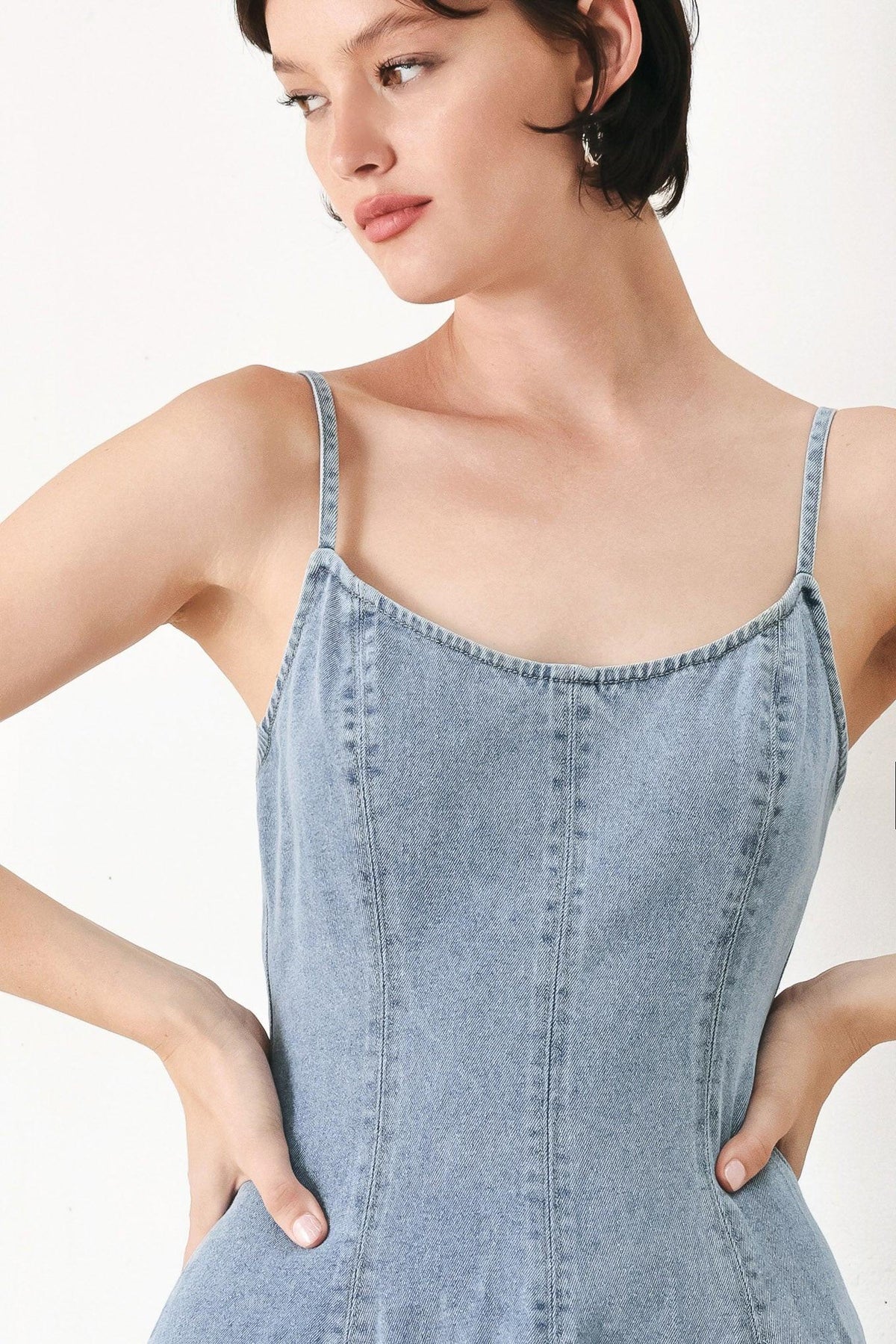 Flying Tomato Cloud Ninette denim midi dress in light wash with thin straps and a fitted silhouette, perfect for casual summer wear.