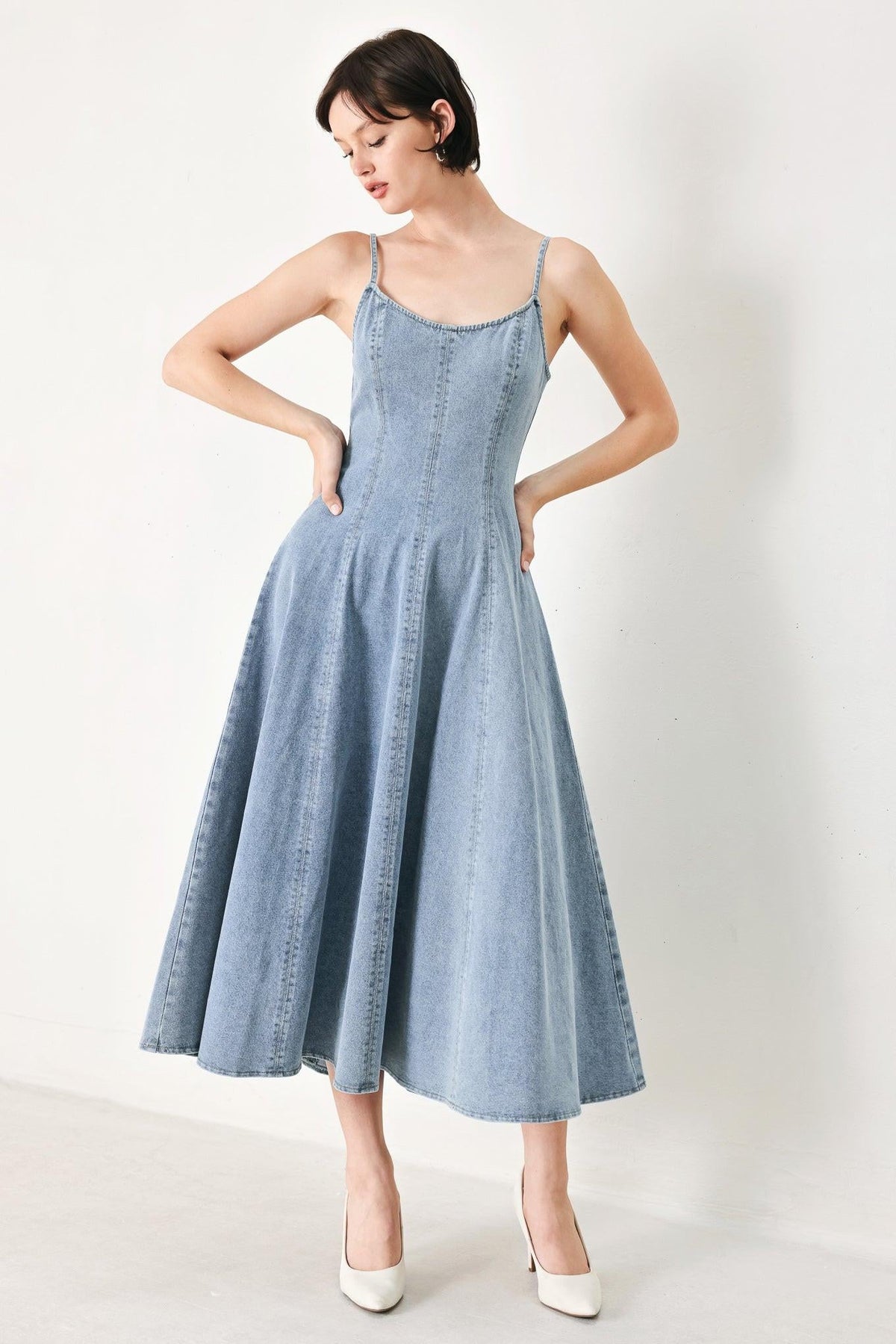 Flying Tomato Cloud Ninette denim midi dress in light wash denim, featuring a fitted bodice and flowing skirt.