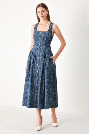 Flying Tomato Midnight Garden denim midi dress with a fitted bodice and flowing skirt, featuring a dark indigo wash and garden-inspired print.