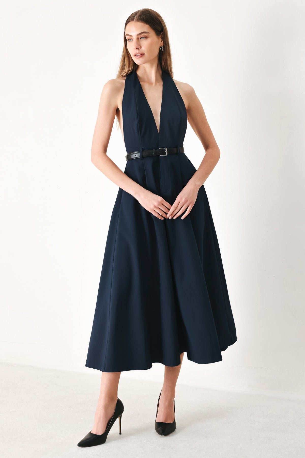 Navy Midnight Form woven midi dress by Flying Tomato featuring a fitted bodice and flowing skirt, displayed on a hanger.