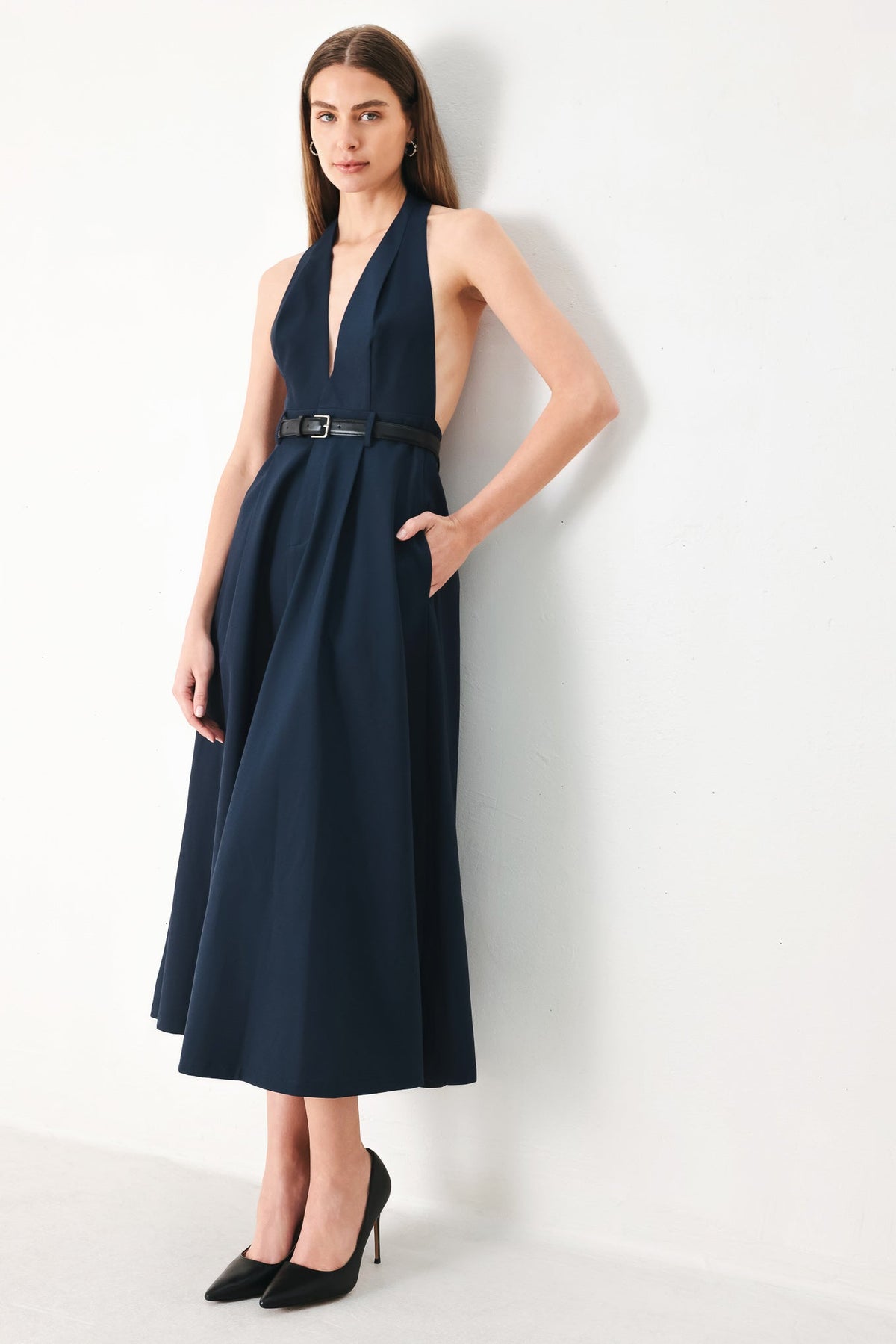 Navy woven midi dress by Flying Tomato featuring a fitted waist and flowing skirt, styled with short sleeves and a V-neck.