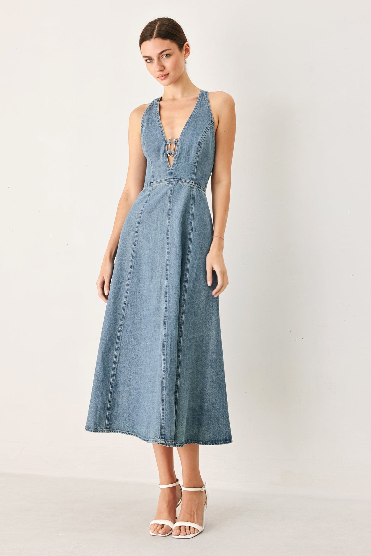 Flying Tomato Sunday Muse denim midi dress in light denim, showcased on a hanger with visible button details and relaxed fit.