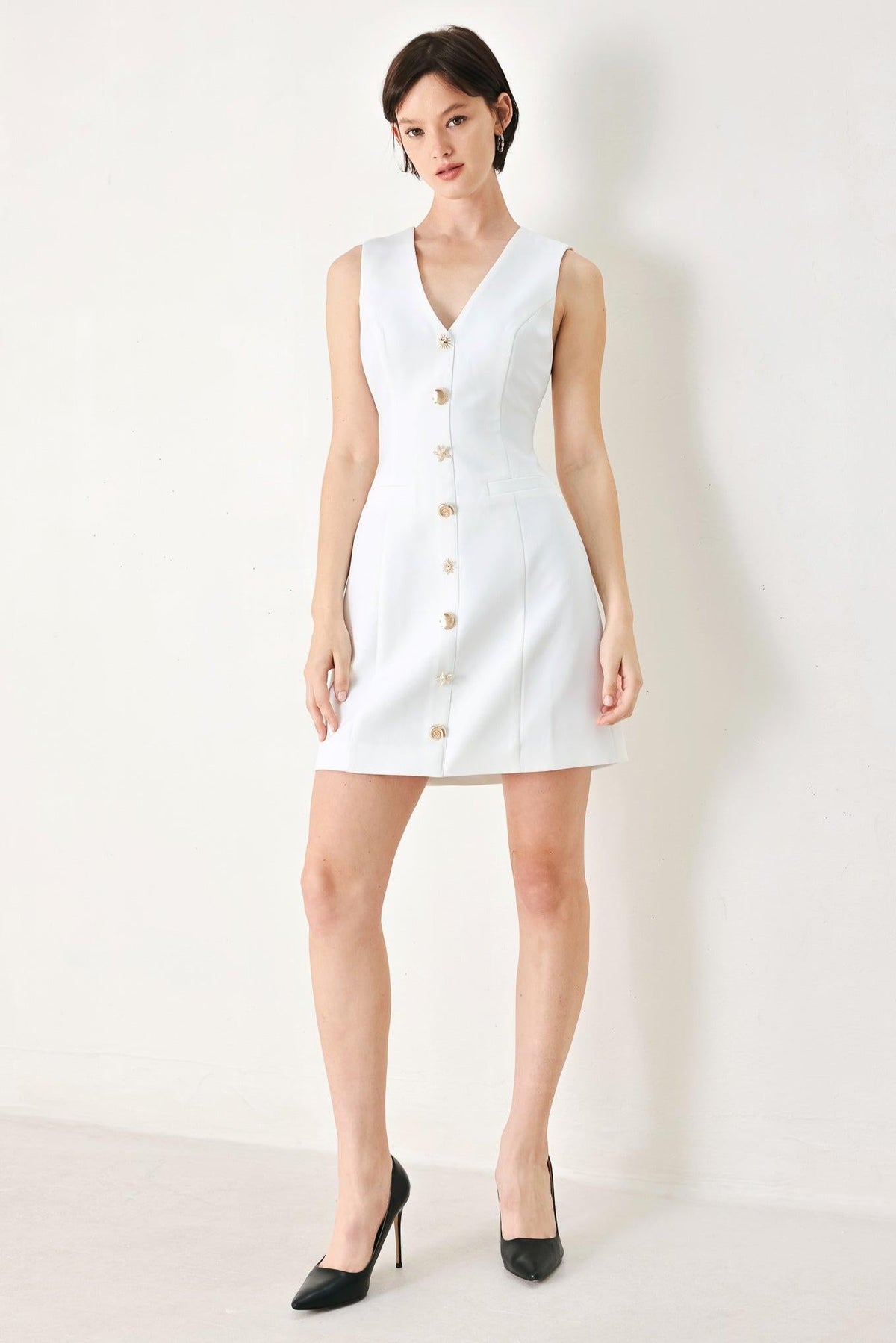 Off-white Flying Tomato Pure Glam Woven Mini Dress displayed on a hanger with intricate woven fabric details.