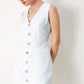 Off-white woven mini dress by Flying Tomato from the PURE GLAM collection, featuring a stylish, textured fabric and sleeveless design.