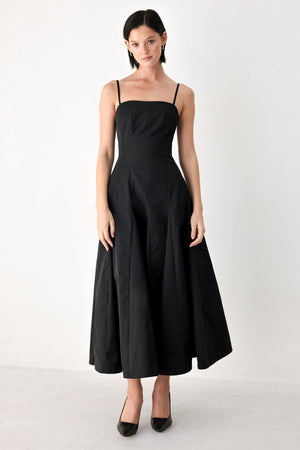 Black Flying Tomato Timeless Romance midi dress with a flowing silhouette, showcased on a hanger.