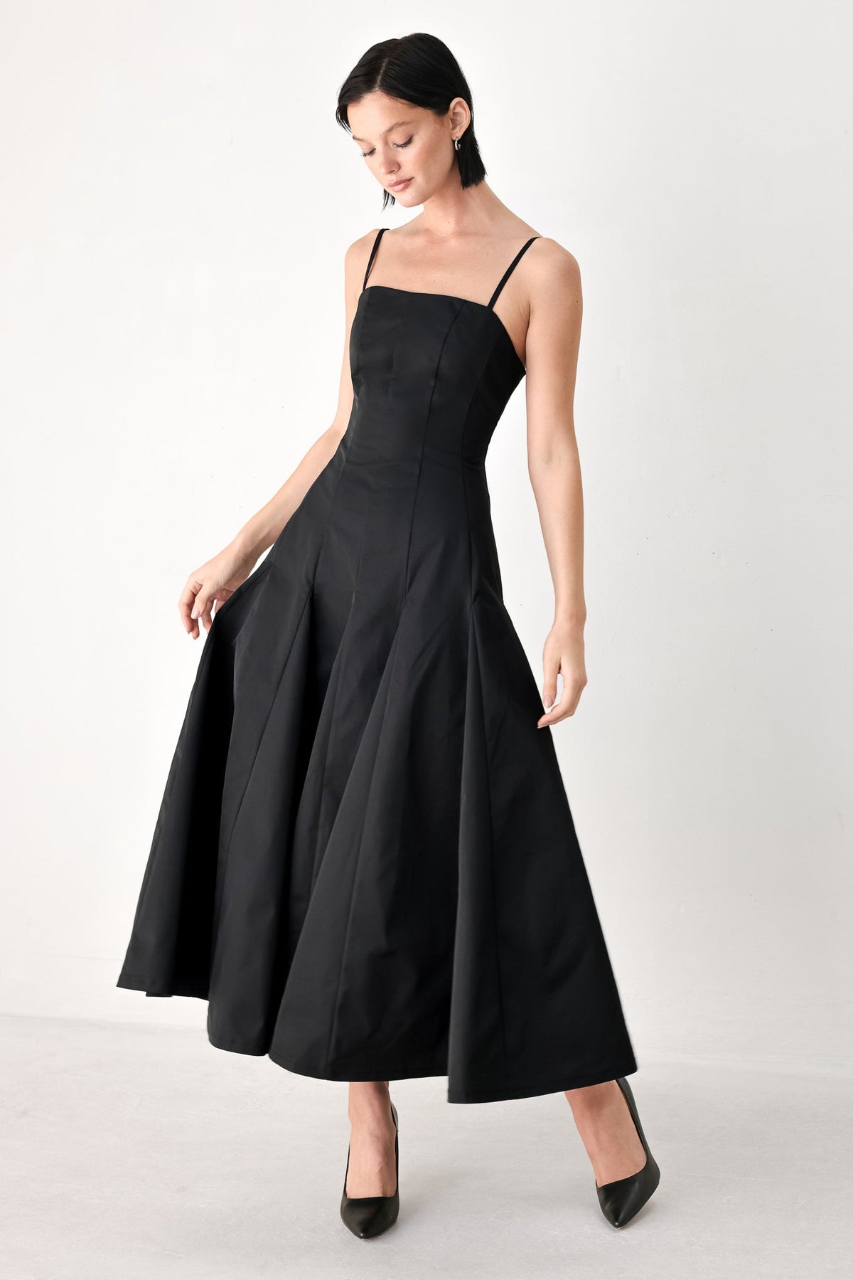 Black Timeless Romance midi dress by Flying Tomato, featuring a elegant flowing fabric and classic silhouette.