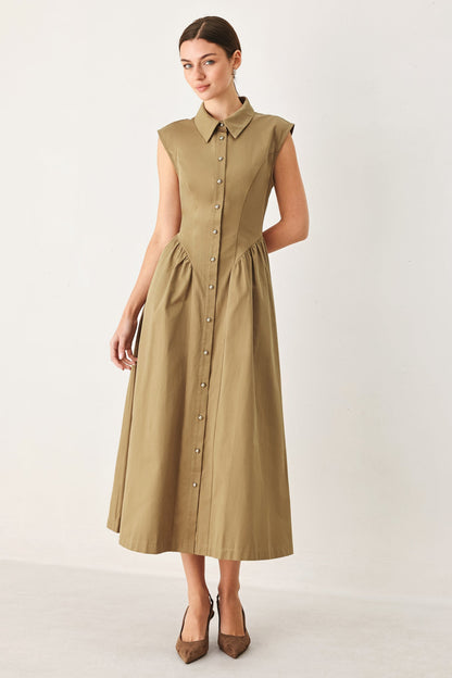 Flying Tomato Mocha Muse woven midi dress displayed on a hanger with a flowing, textured fabric in a mocha color.