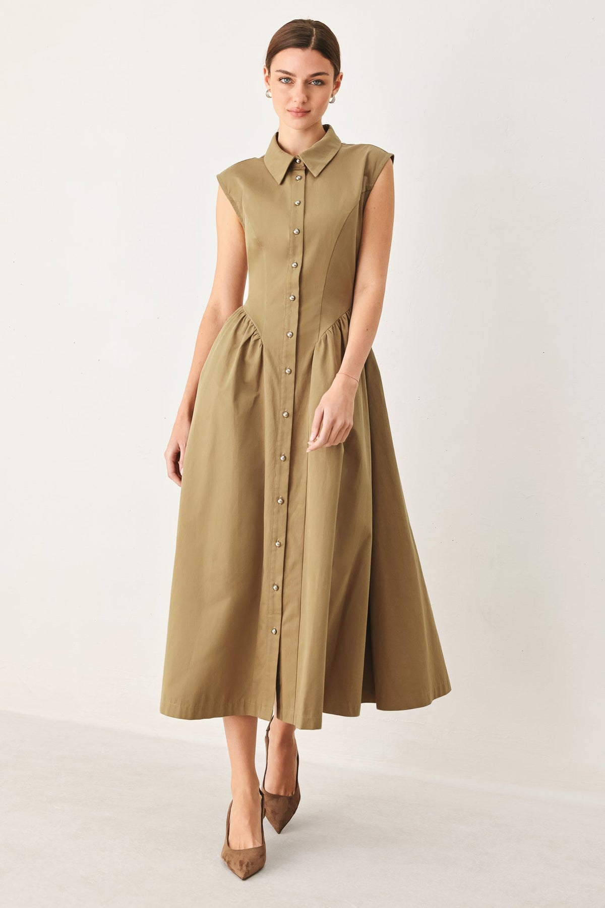 Flying Tomato Mocha Muse woven midi dress displayed on a hanger, showcasing its flowy fabric and stylish design.
