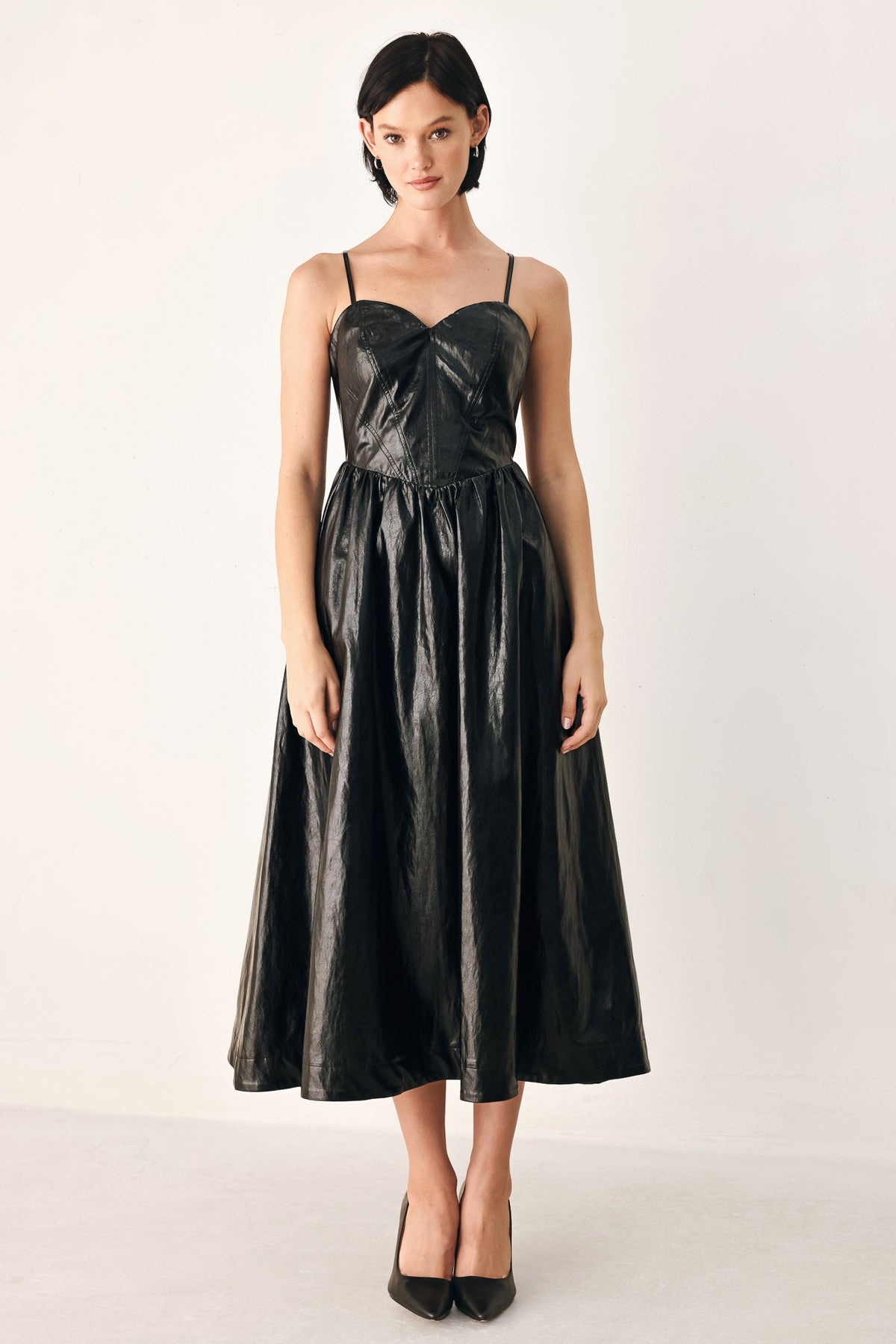 Flying Tomato Dressed to Thrill faux leather midi dress in black, featuring a sleek, fitted design perfect for stylish occasions.
