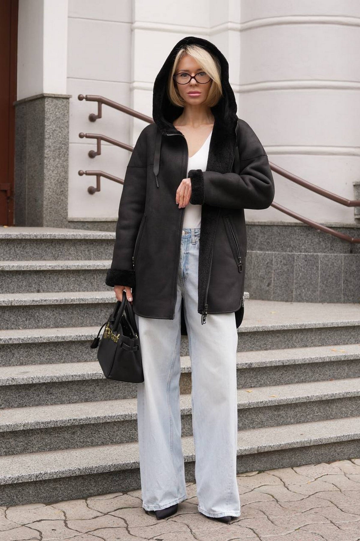 Alaska® Grazia reversible faux shearling hooded coat in black and black, shown from the front