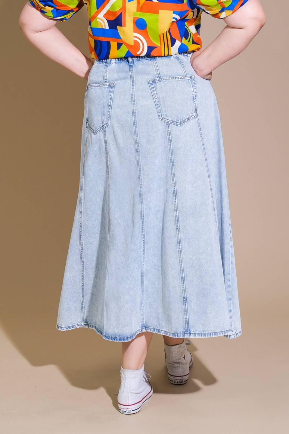 Light denim Urban Cowgirl midi skirt by Flying Tomato, featuring a classic denim design and midi length, shown on a model.