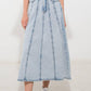 Flying Tomato urban cowgirl denim midi skirt in light wash with a classic A-line silhouette and front pockets.