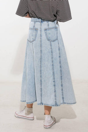 Light wash denim midi skirt by Flying Tomato from the Urban Cowgirl collection, featuring a classic A-line silhouette.