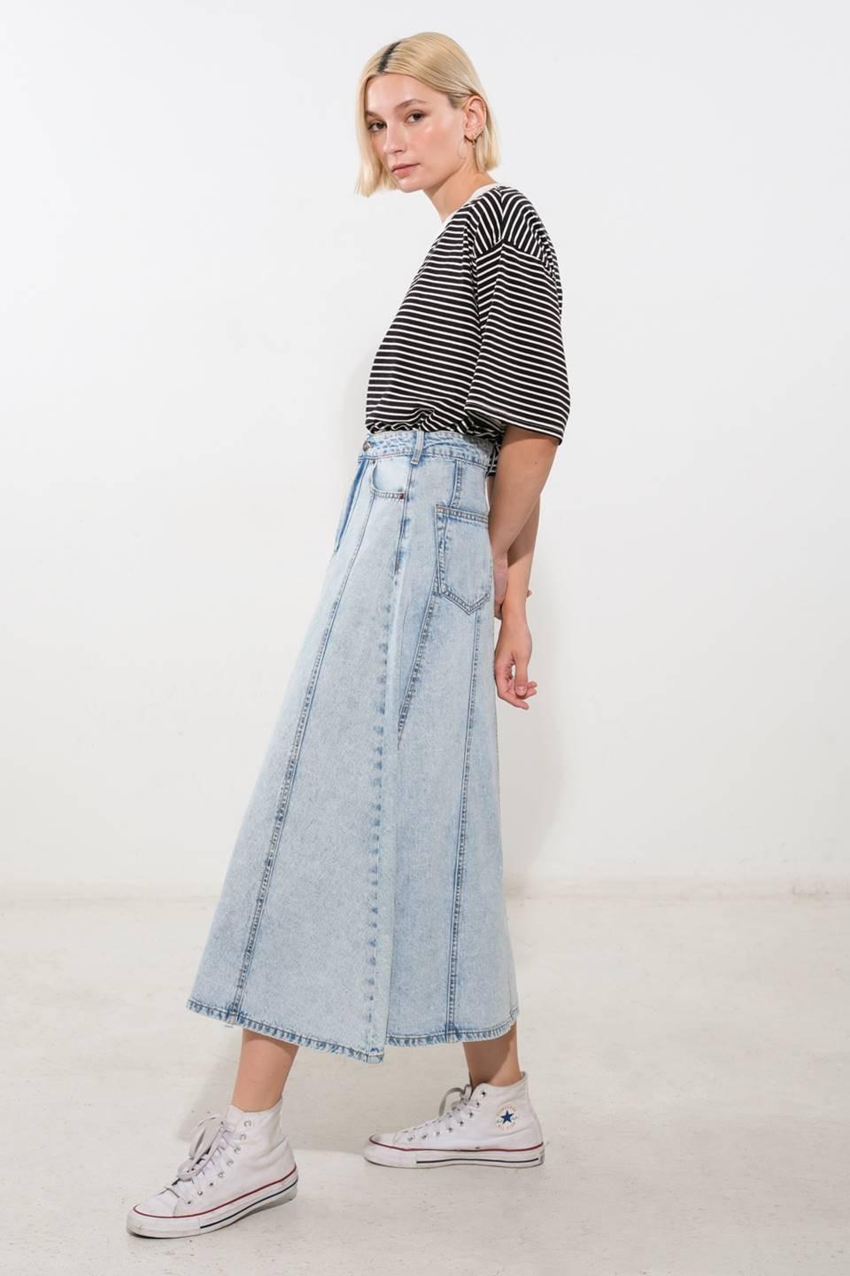 Light denim Urban Cowgirl denim midi skirt by Flying Tomato, featuring a stylish, casual design with a high waist and side pockets.