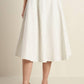 Flying Tomato Walk With Me woven midi skirt in white and black, featuring a stylish, flowy design and intricate woven fabric.