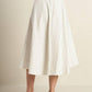 White and black woven midi skirt from Flying Tomato's Walk With Me collection, featuring a stylish, flowing design.