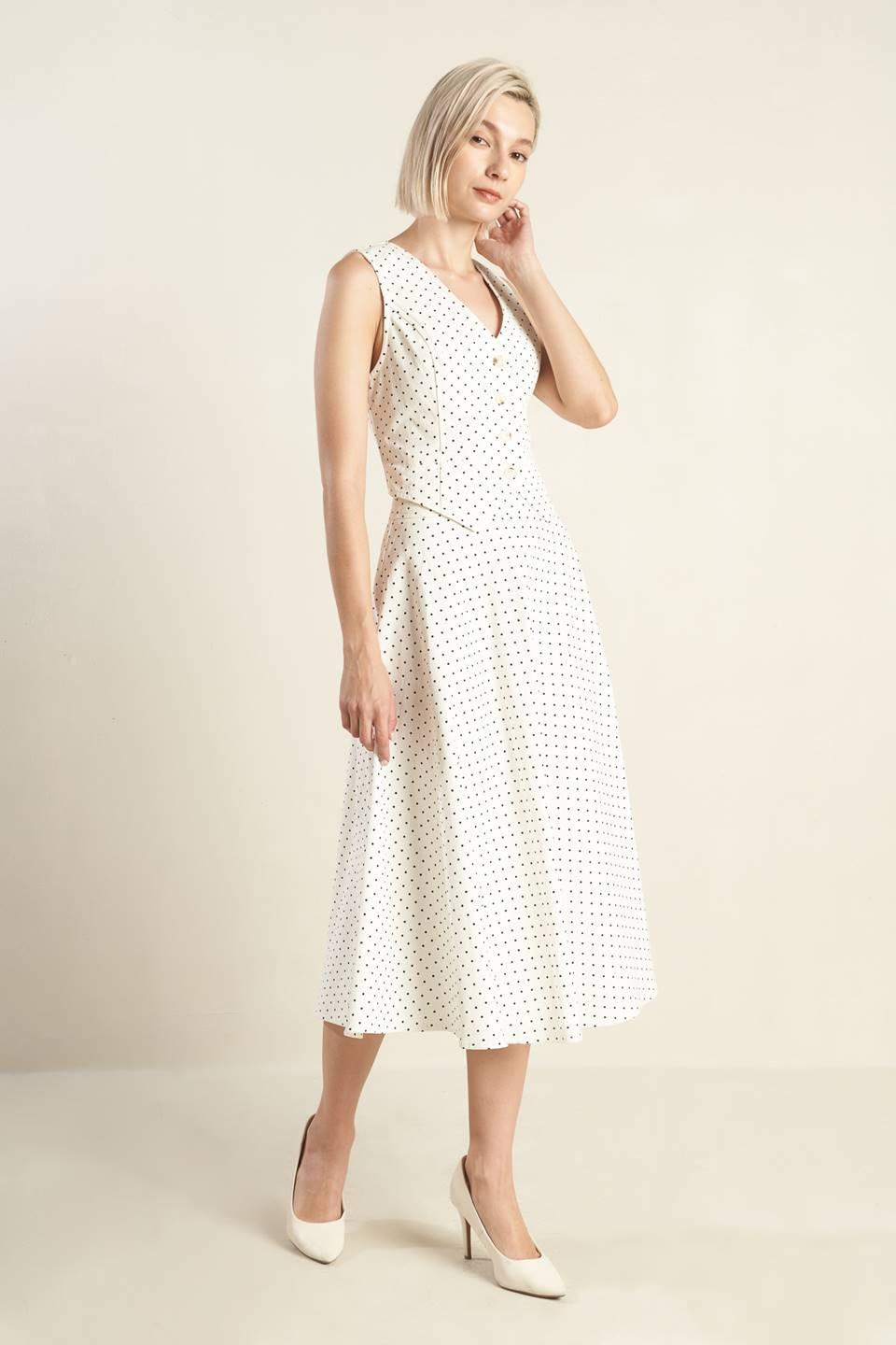 White and black woven midi skirt from Flying Tomato's Walk With Me collection, featuring a stylish, flowy design and intricate weaving.