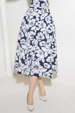 Navy woven midi skirt from Flying Tomato featuring a plain design, styled with a relaxed fit and lightweight fabric.