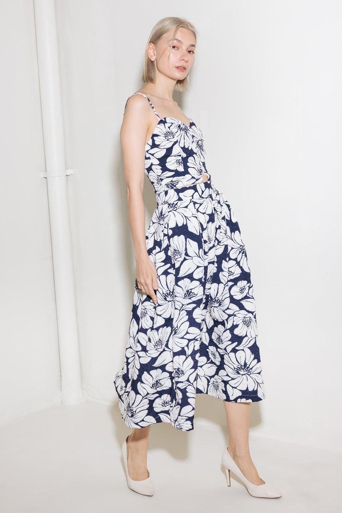 Navy woven midi skirt from Flying Tomato featuring a simple, elegant design and a comfortable fit.