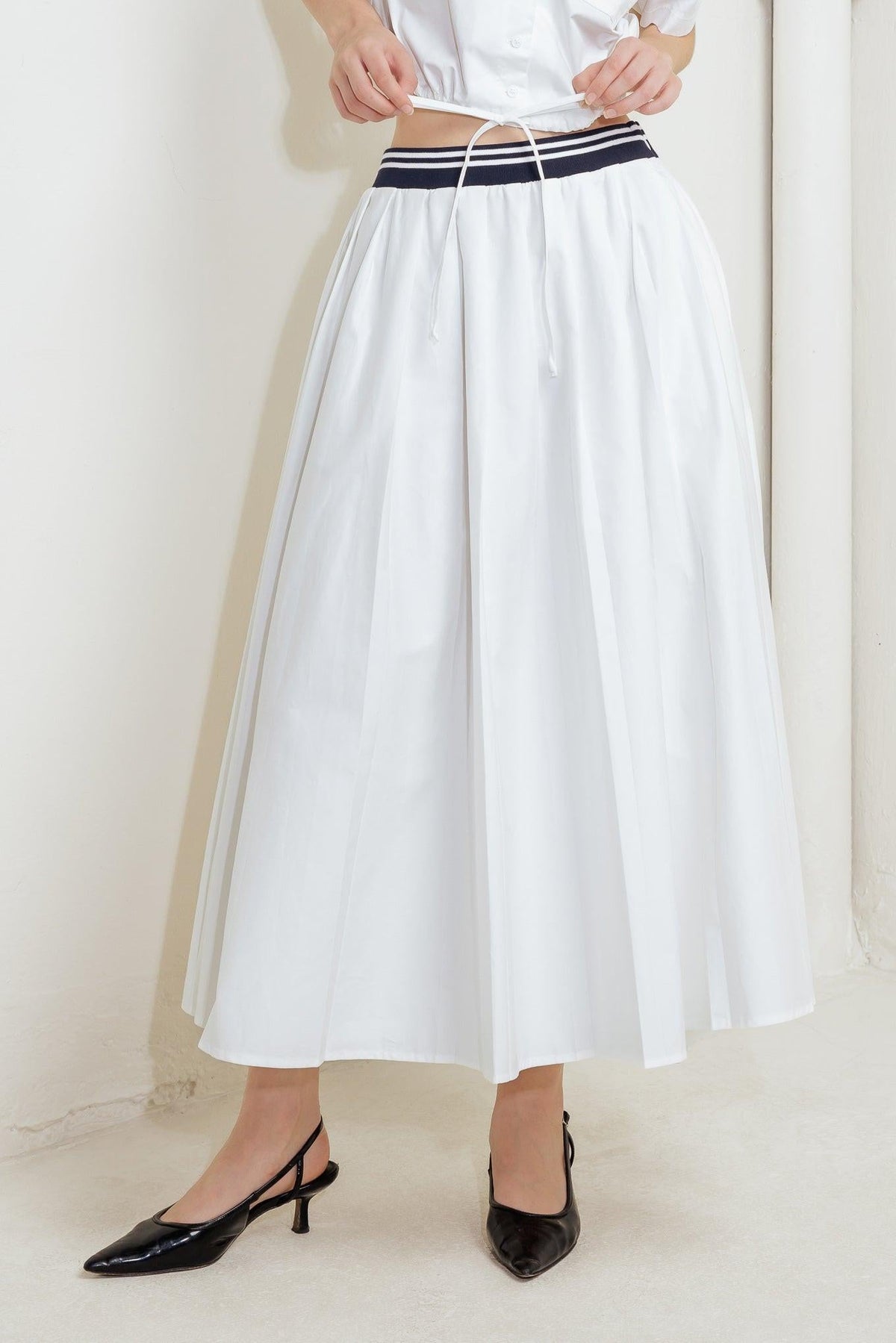 Flying Tomato Coastal Collar woven midi skirt in white, flowing fabric with a stylish, casual design perfect for summer wear.