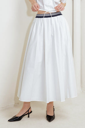 Flying Tomato Coastal Collar woven midi skirt in white, flowing fabric with a stylish, casual design perfect for summer wear.