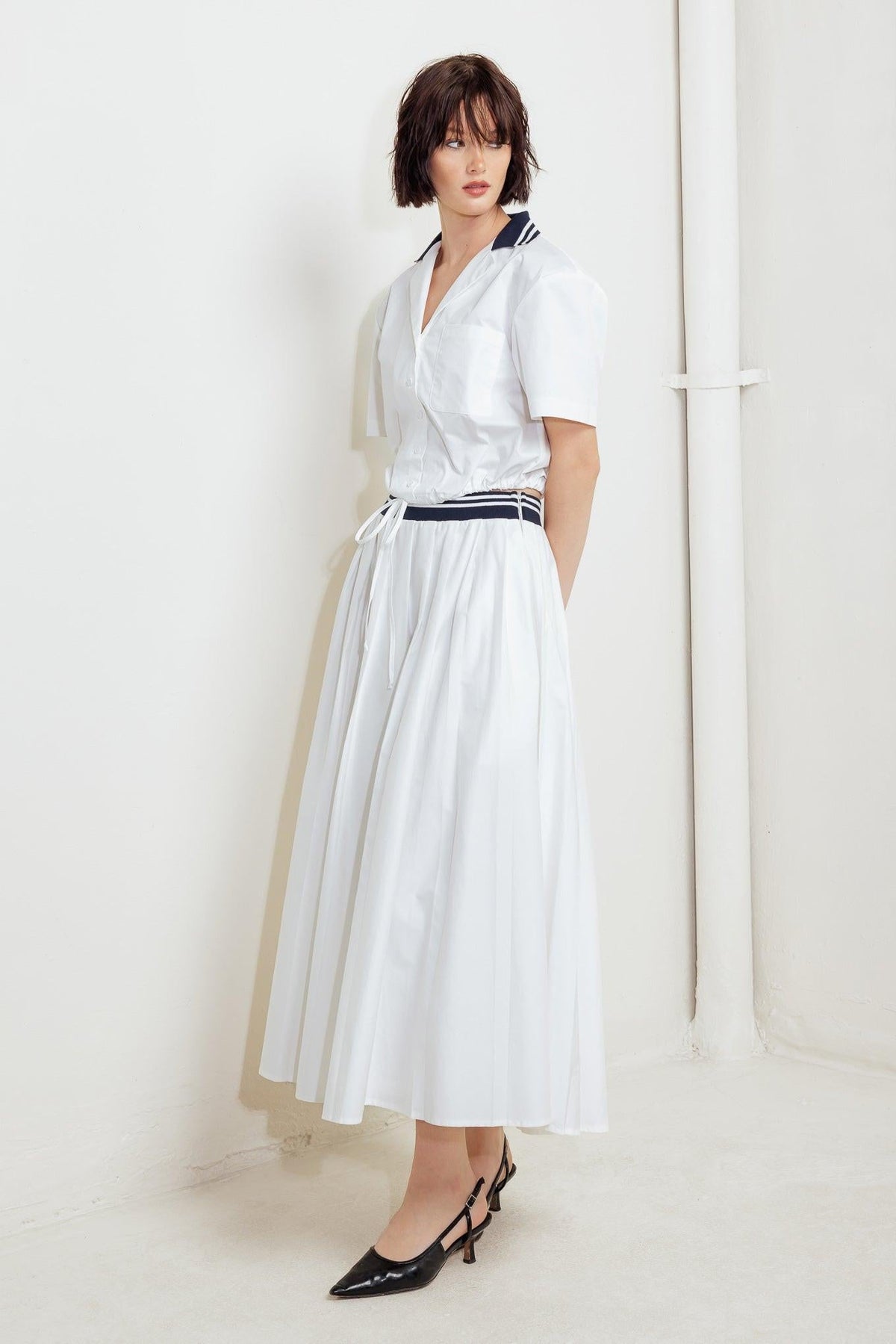 White Coastal Collar Woven Midi Skirt by Flying Tomato, featuring a flowy, patterned design and a comfortable, stylish fit.