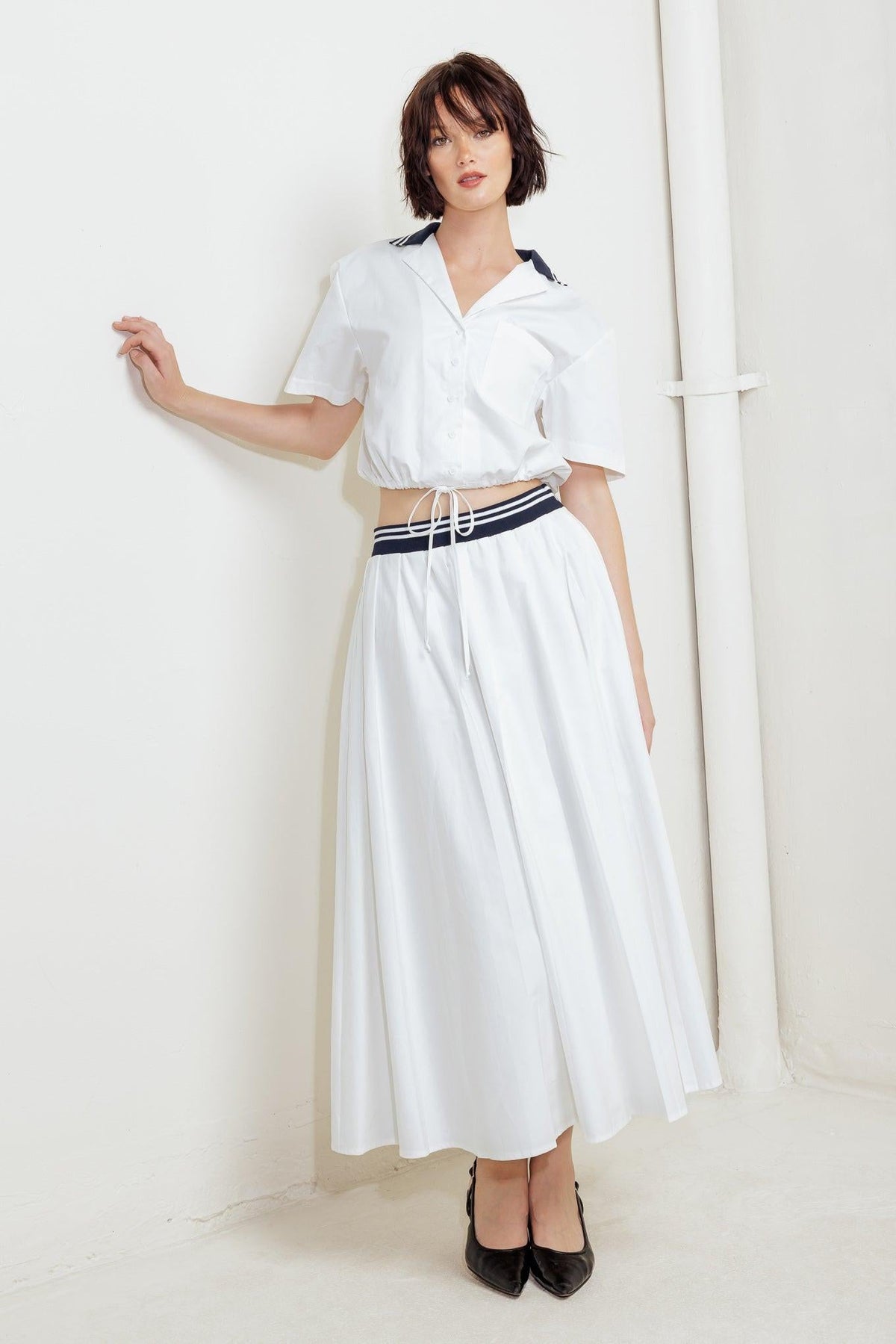 Flying Tomato Coastal Collar woven midi skirt in white, featuring a flowy, lightweight design with a stylish, relaxed fit.