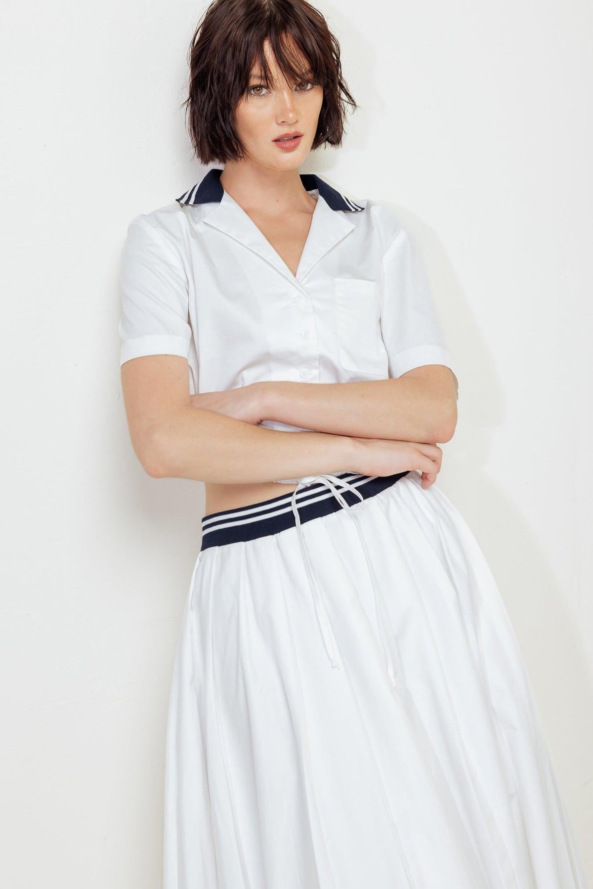 White Coastal Collar Woven Midi Skirt by Flying Tomato, featuring a flowy fabric and a stylish collar detail.
