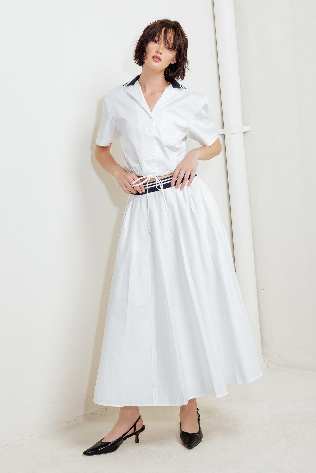 Flying Tomato coastal woven midi skirt in white, featuring a relaxed fit and subtle textured fabric for casual summer style.