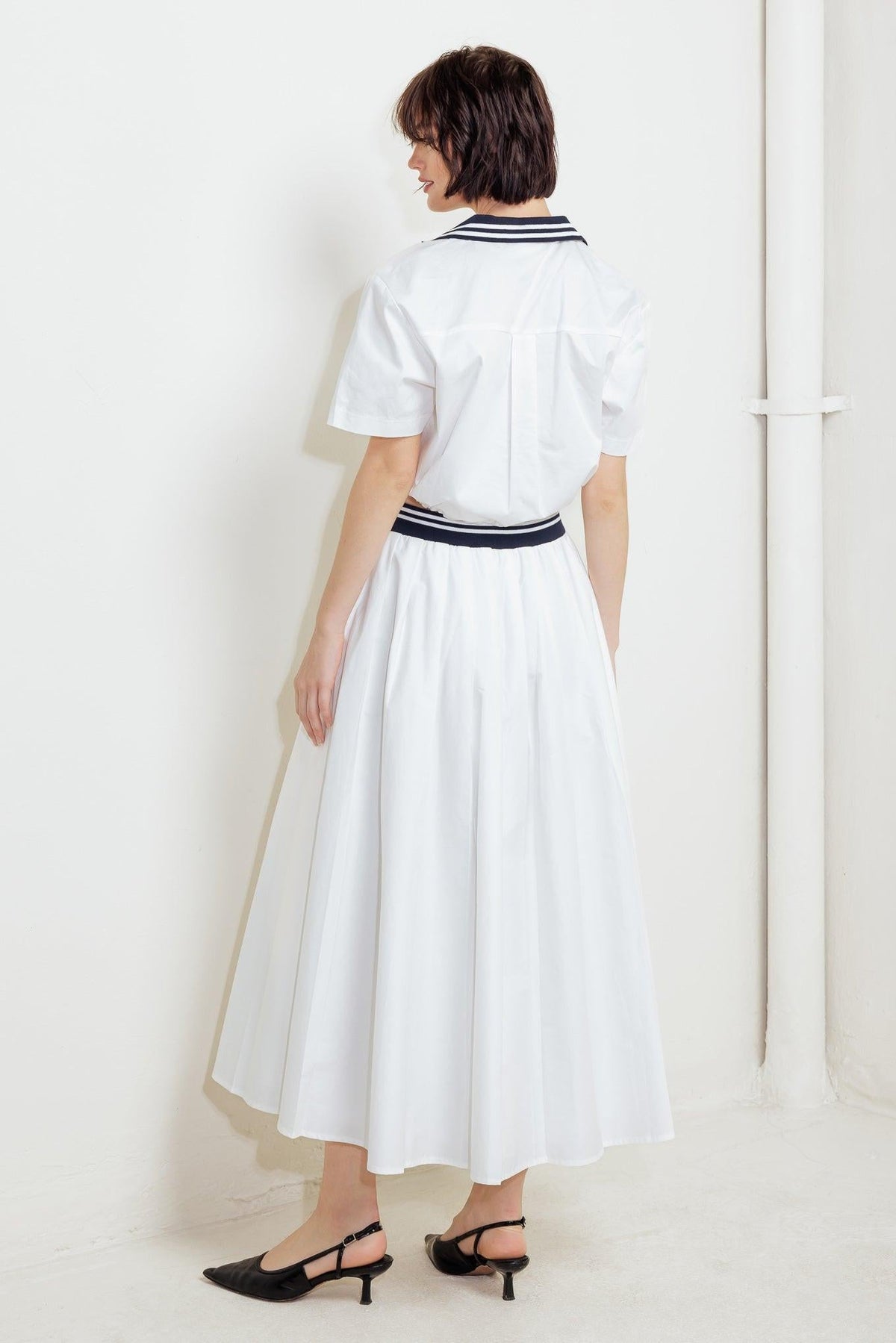 Flying Tomato Coastal Collar woven midi skirt in white, flowing with a relaxed, stylish design and intricate woven details.