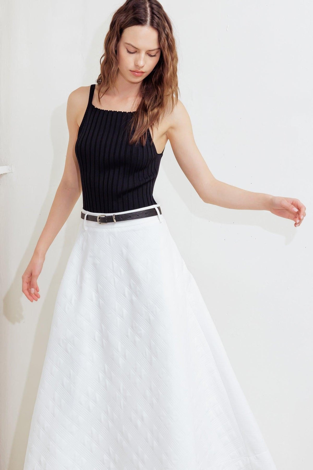 Flying Tomato Downtown Ease woven midi skirt in white, flowing fabric with a relaxed fit and subtle woven texture.