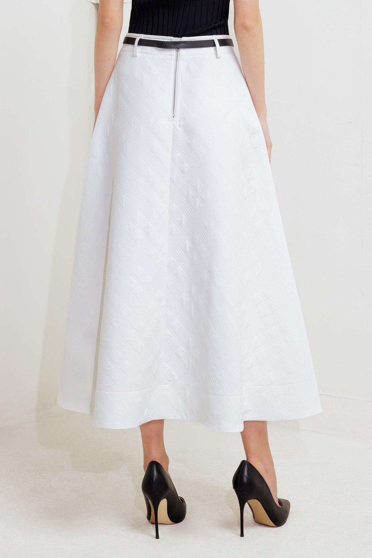 White woven midi skirt from Flying Tomato's Downtown Ease collection, featuring a flowy, lightweight fabric and relaxed fit.