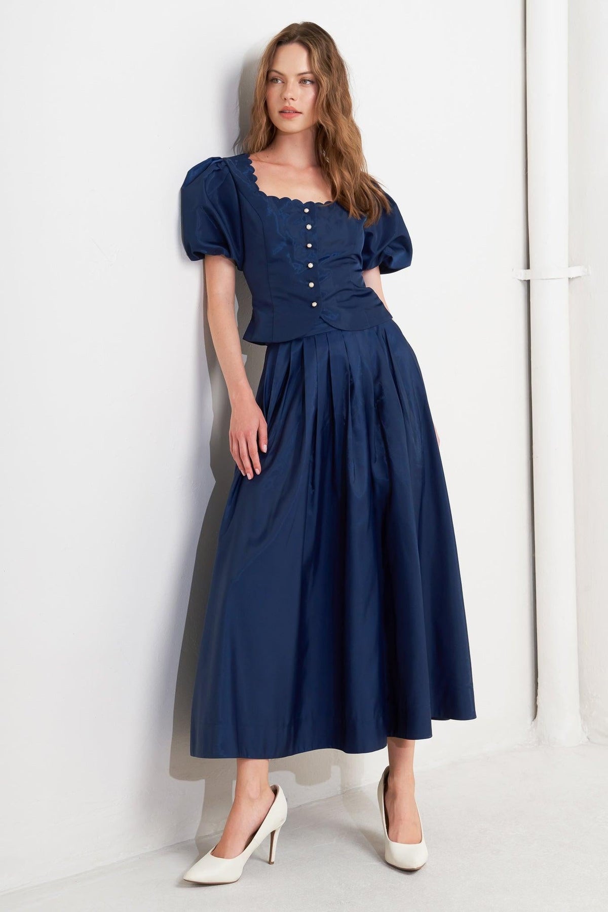 Navy blue Luxe Flare Woven Pleated Midi Skirt by Flying Tomato with a high waist and flowing, pleated fabric.