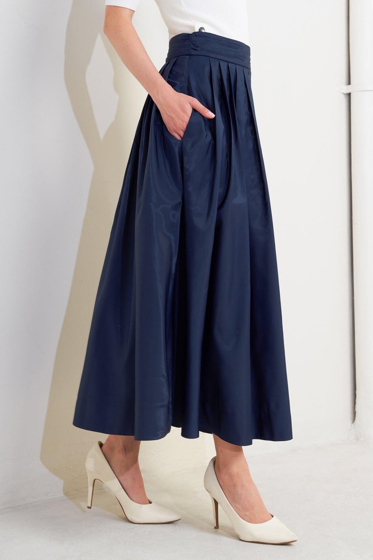 Navy Luxe Flare Woven Pleated Midi Skirt by Flying Tomato, with a flowing flare and pleated design, styled for elegant wear.