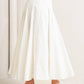 White woven circle skirt by Flying Tomato featuring a pale frame design, displayed on a neutral background.